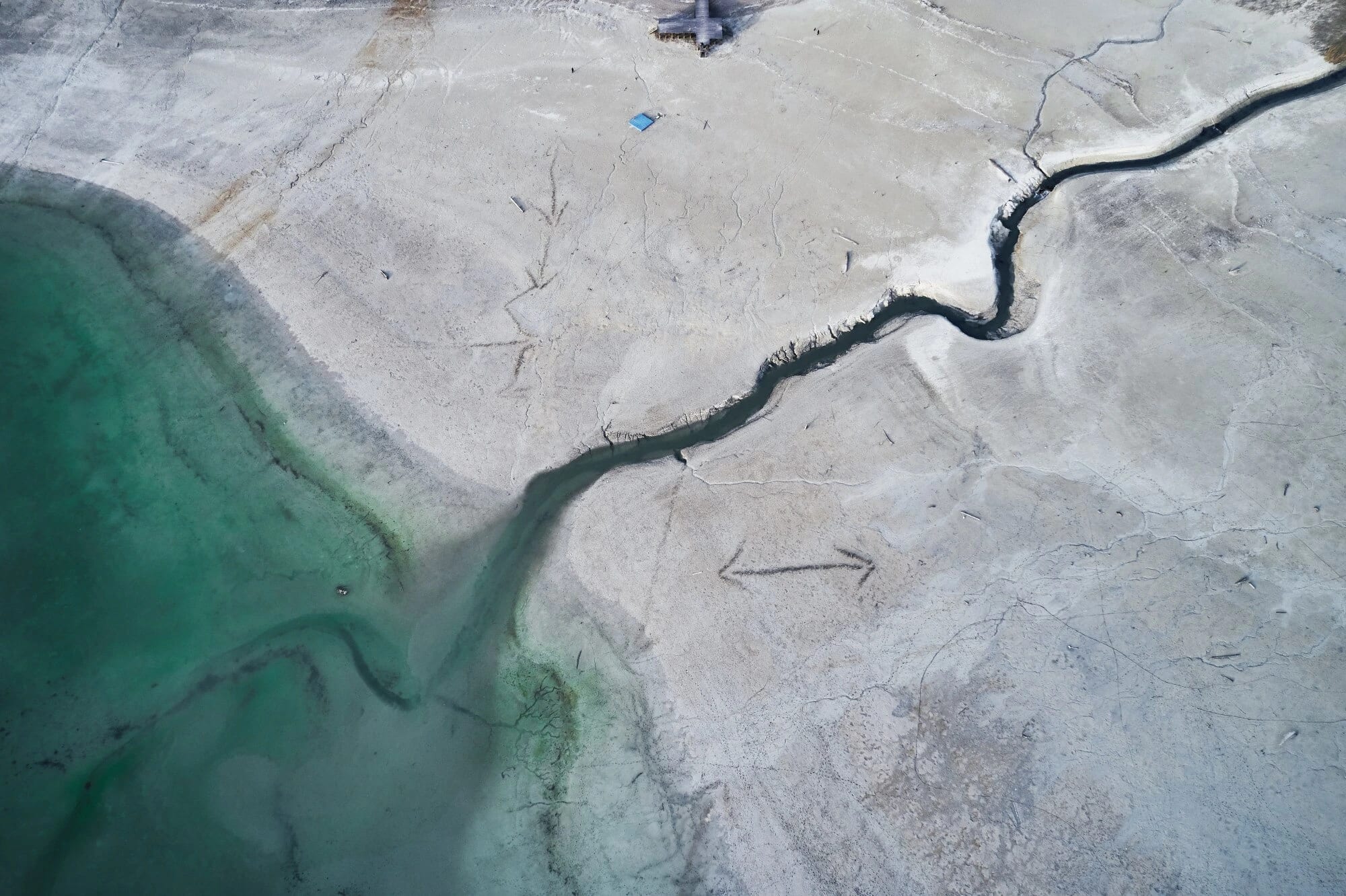Aerial view of water covering agricultural fields.