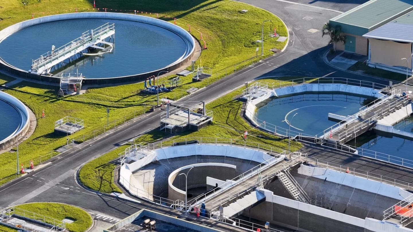 Circular settling tanks form part of a large wastewater-treatment facility.