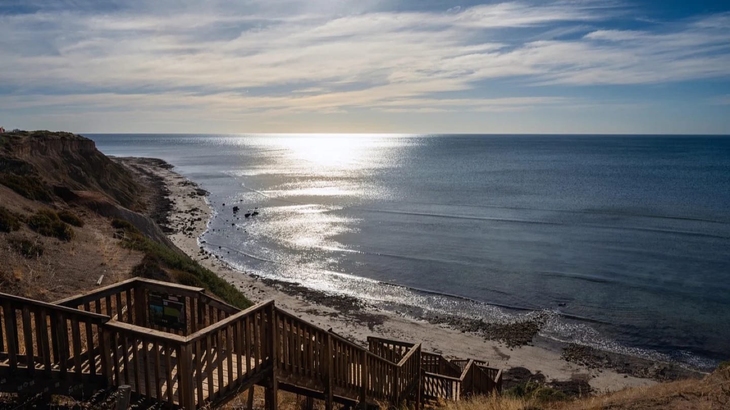Steps descend from coastal cliffs to Willunga Beach in South Australia.