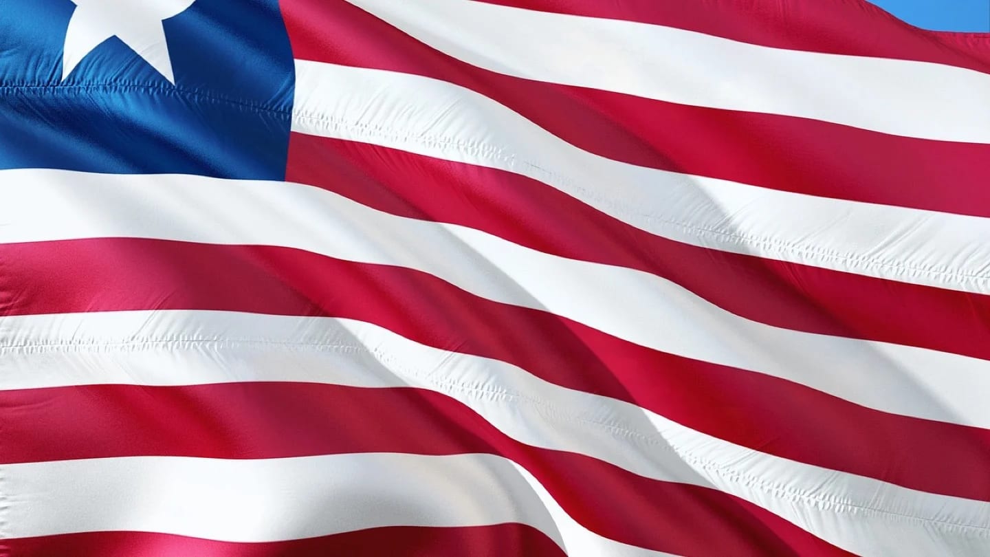 The national flag of Liberia fills the frame.
