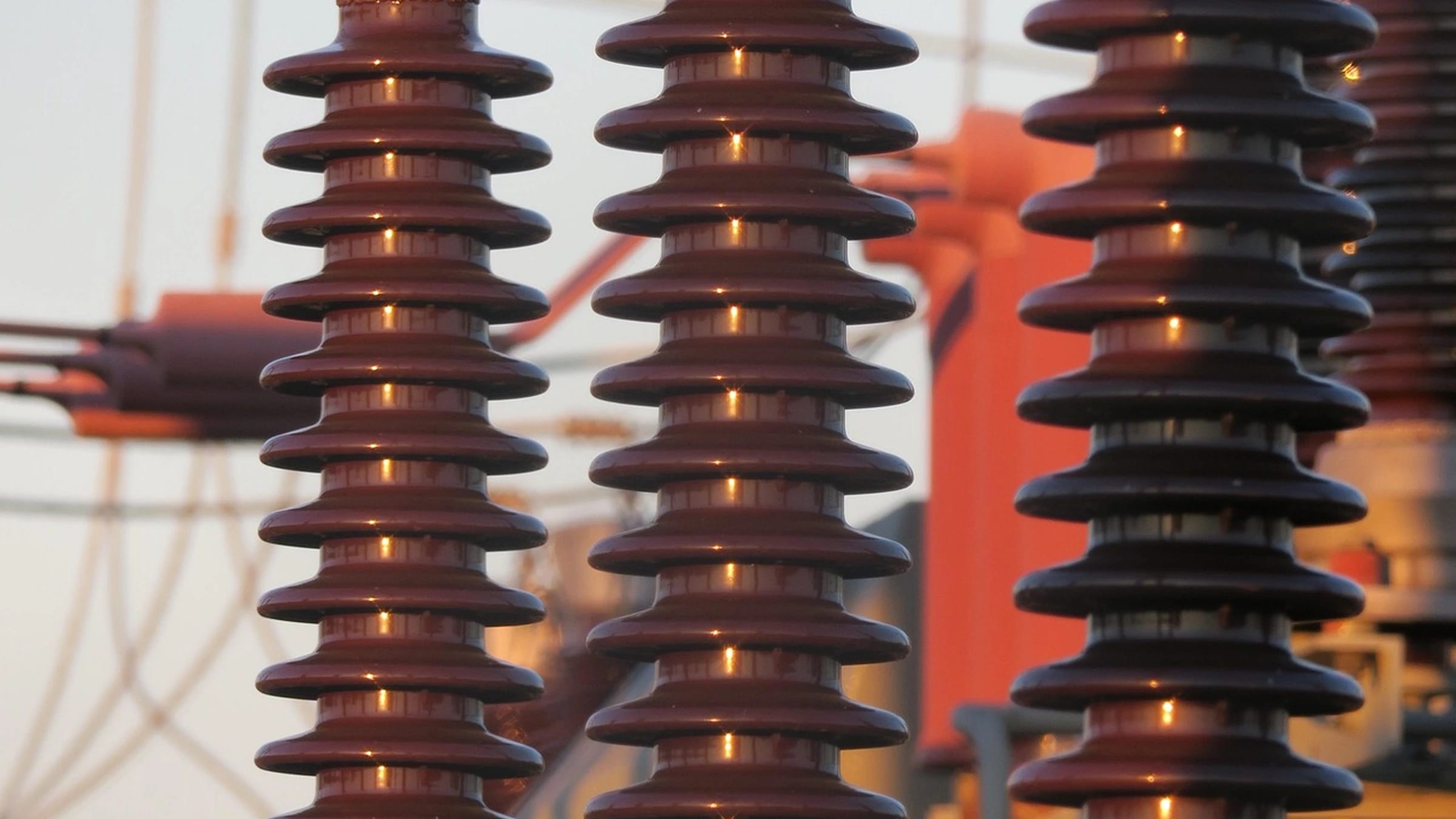 Close view of electrical insulators and transmission equipment
