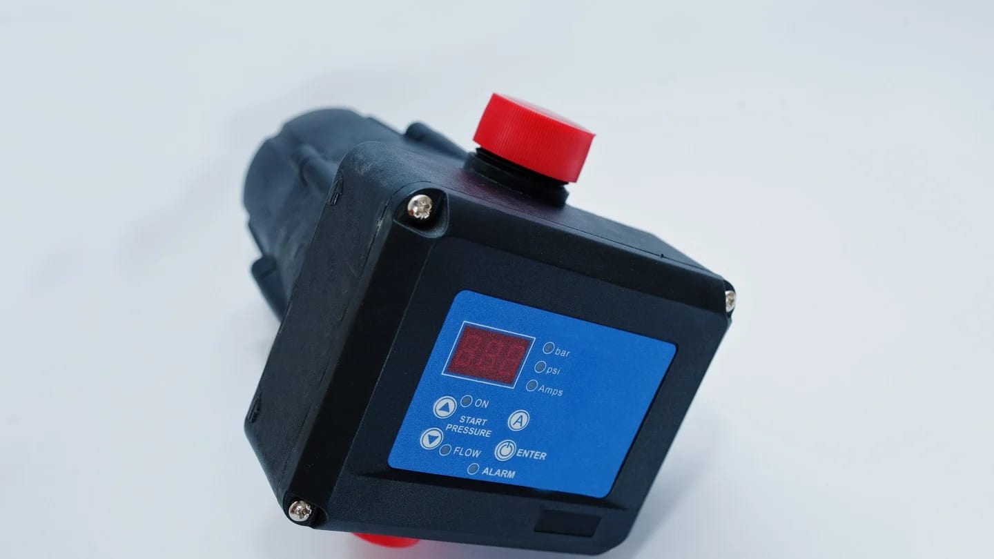 A digital water-pump controller with a display for pressure, flow and operating alarms.