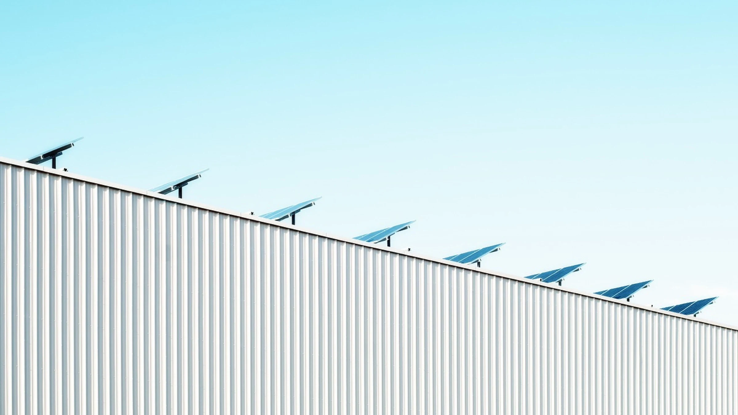 An array of solar panels mounted on a roof.