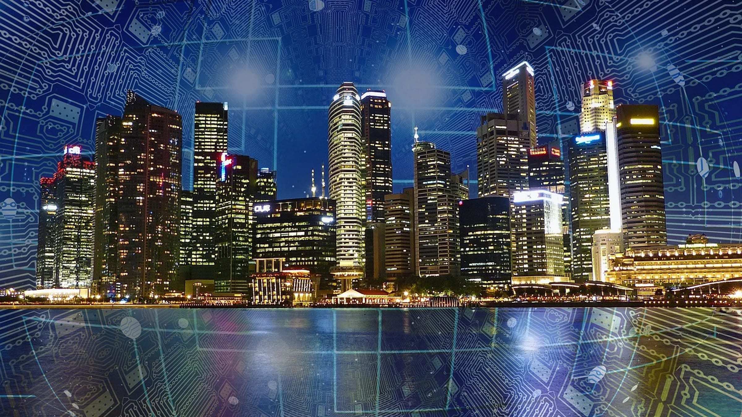 A city skyline overlaid with a blue digital network pattern.