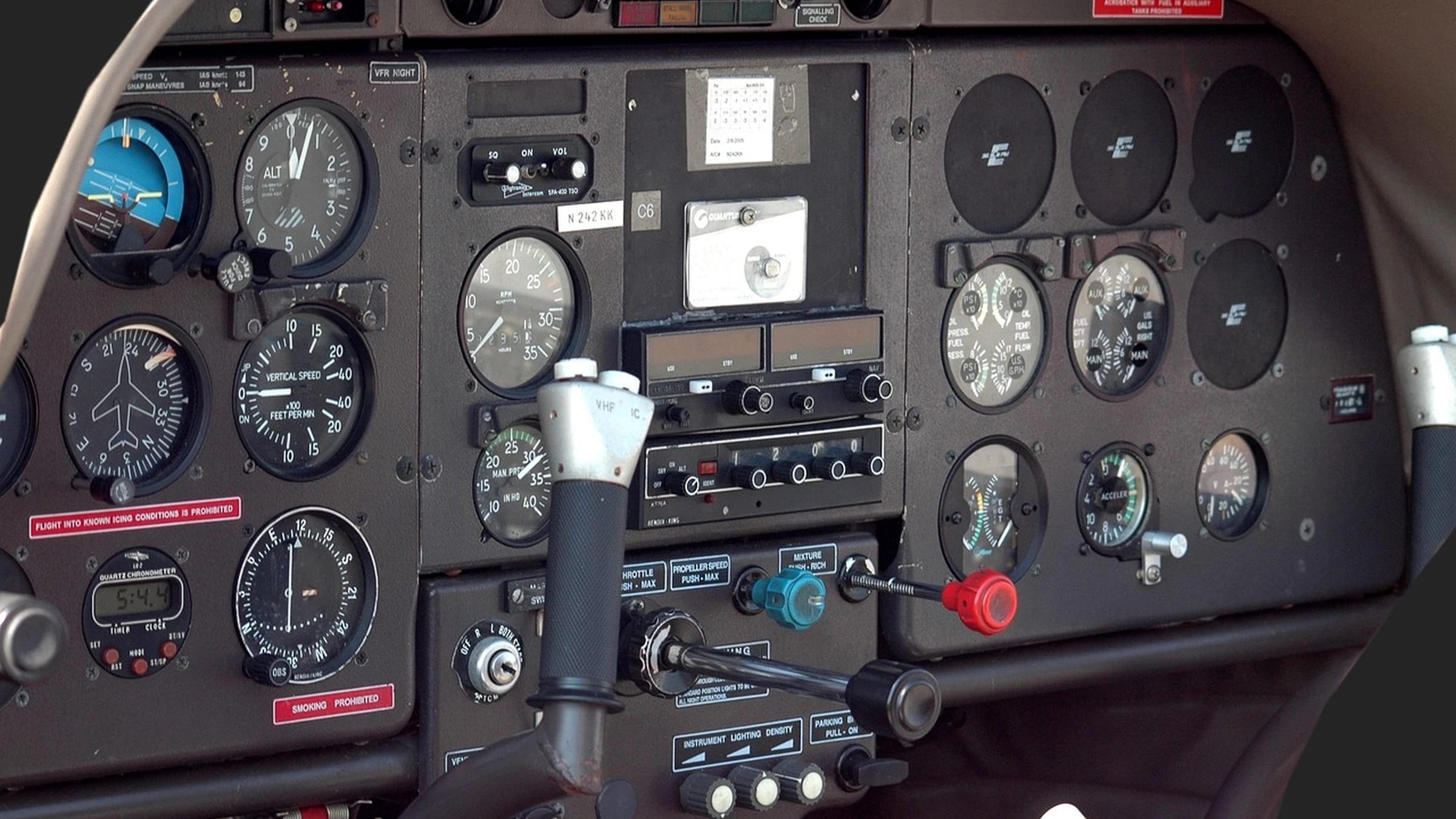 Close-up of analog aircraft cockpit instruments
