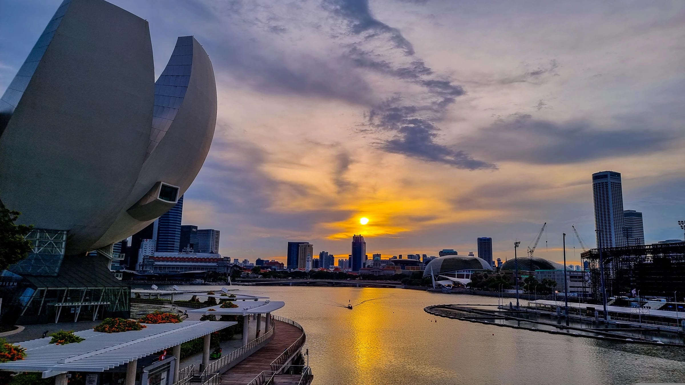 Singapore’s Marina Bay waterfront with its skyline and waterfront buildings.