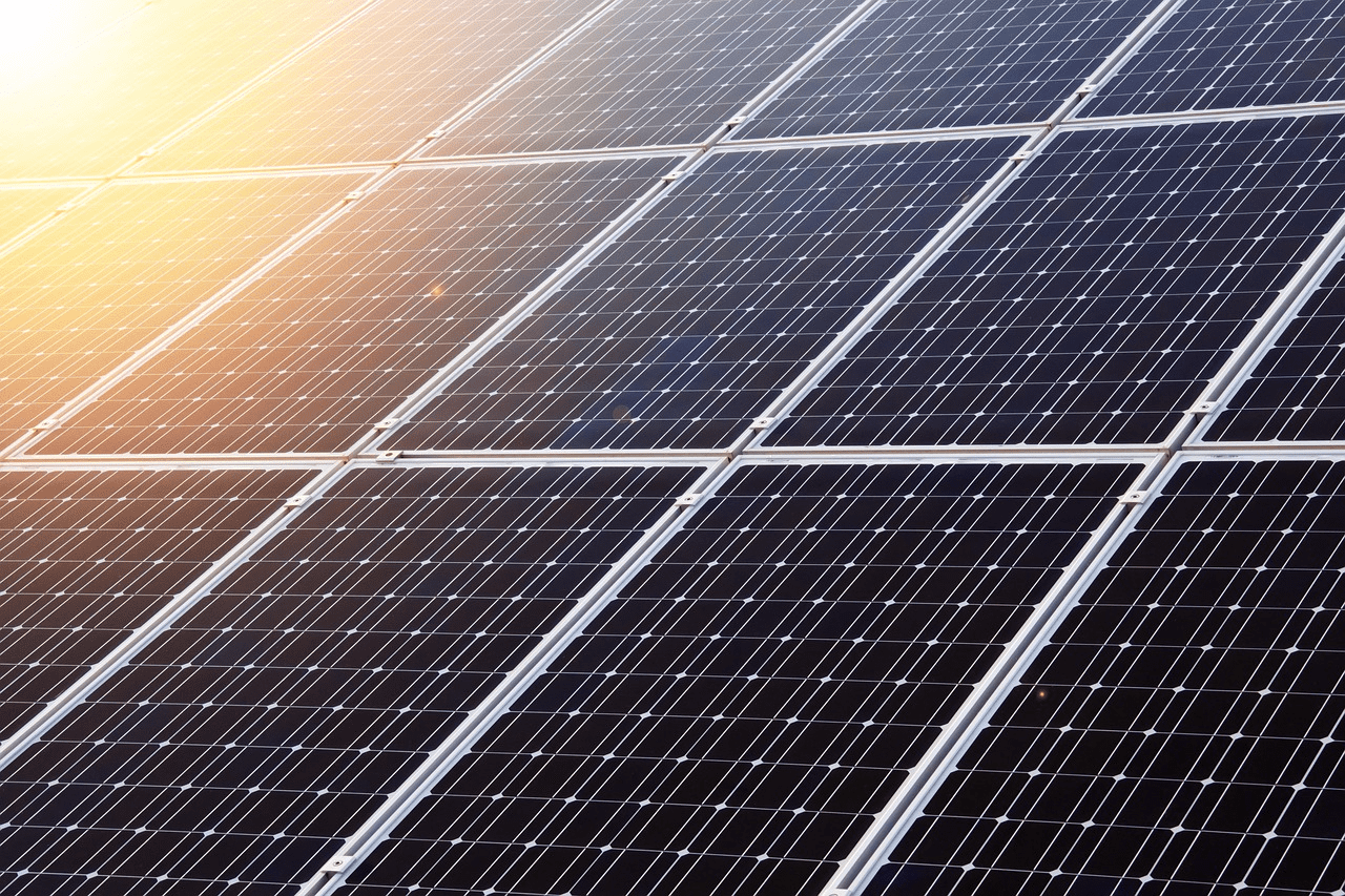 Close-up of solar panels generating renewable energy, symbolizing clean power integration in water utilities.