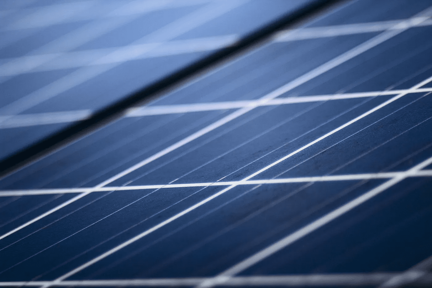 Close-up of solar panels representing floating photovoltaic (FPV) technology used on reservoirs for renewable energy generation.