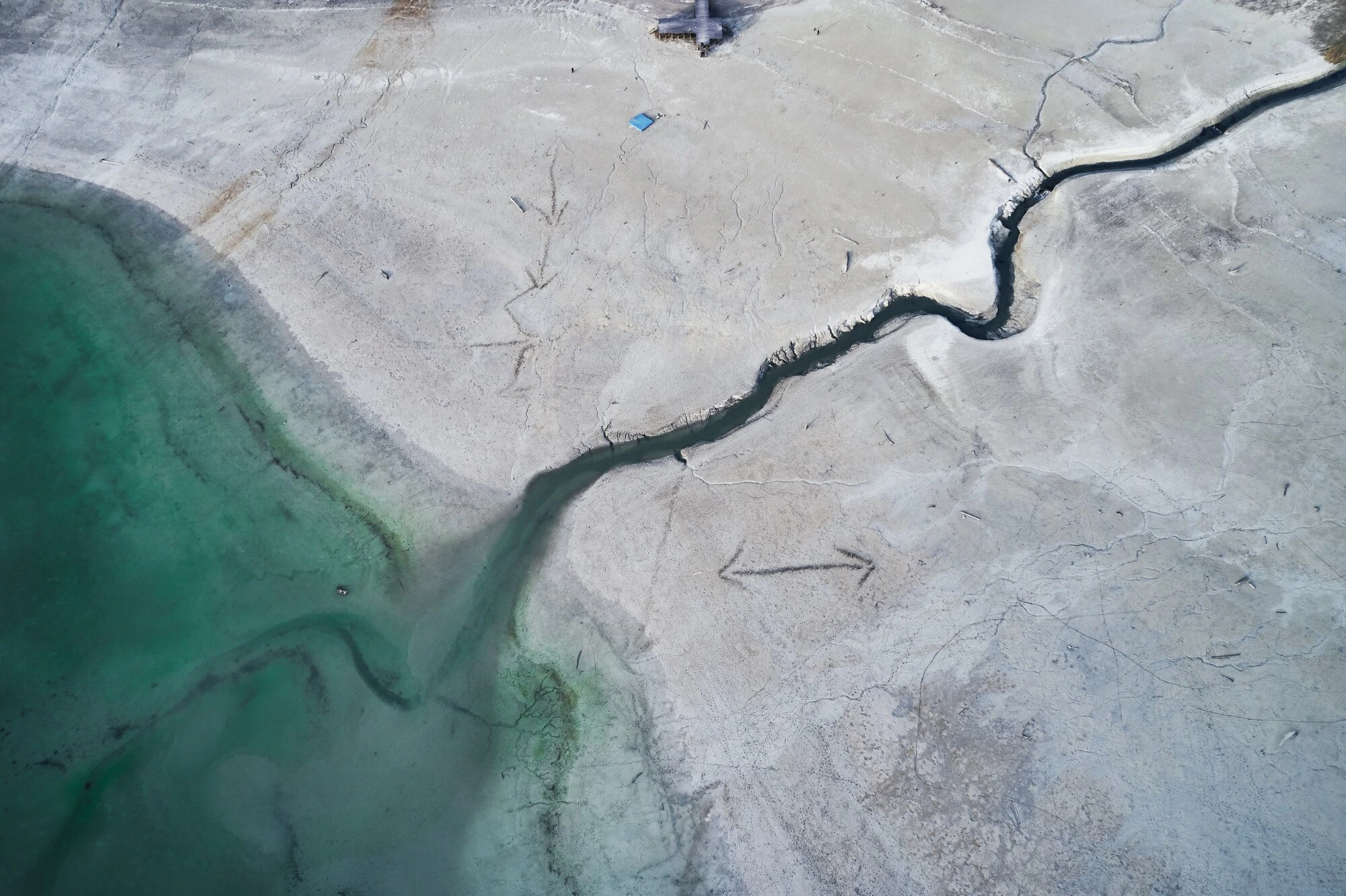 Aerial view of water covering agricultural fields.