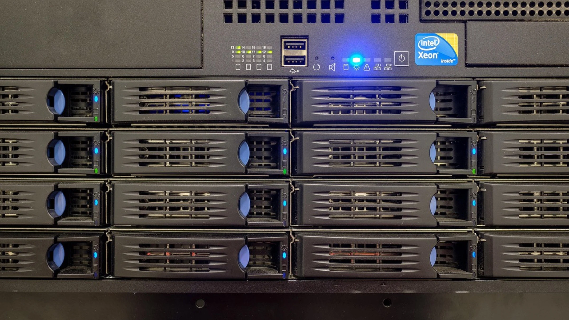 Close view of rack-mounted server hardware and drive bays.