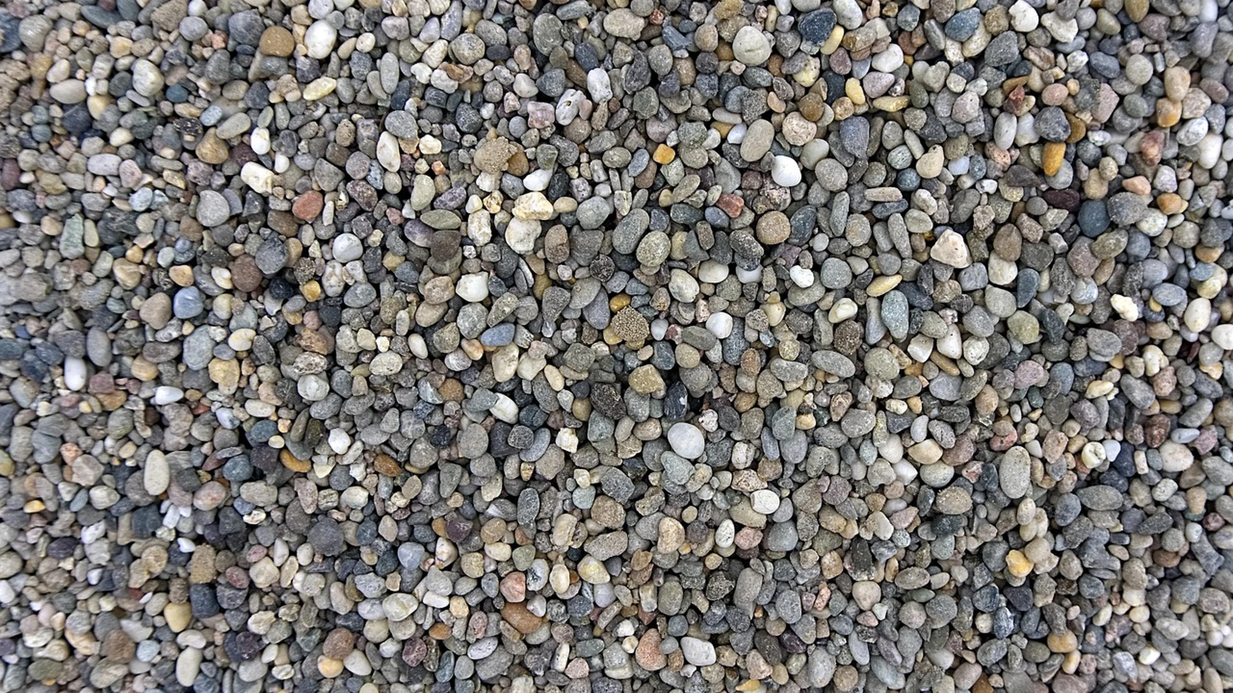 Close-up texture of small stones and gravel.
