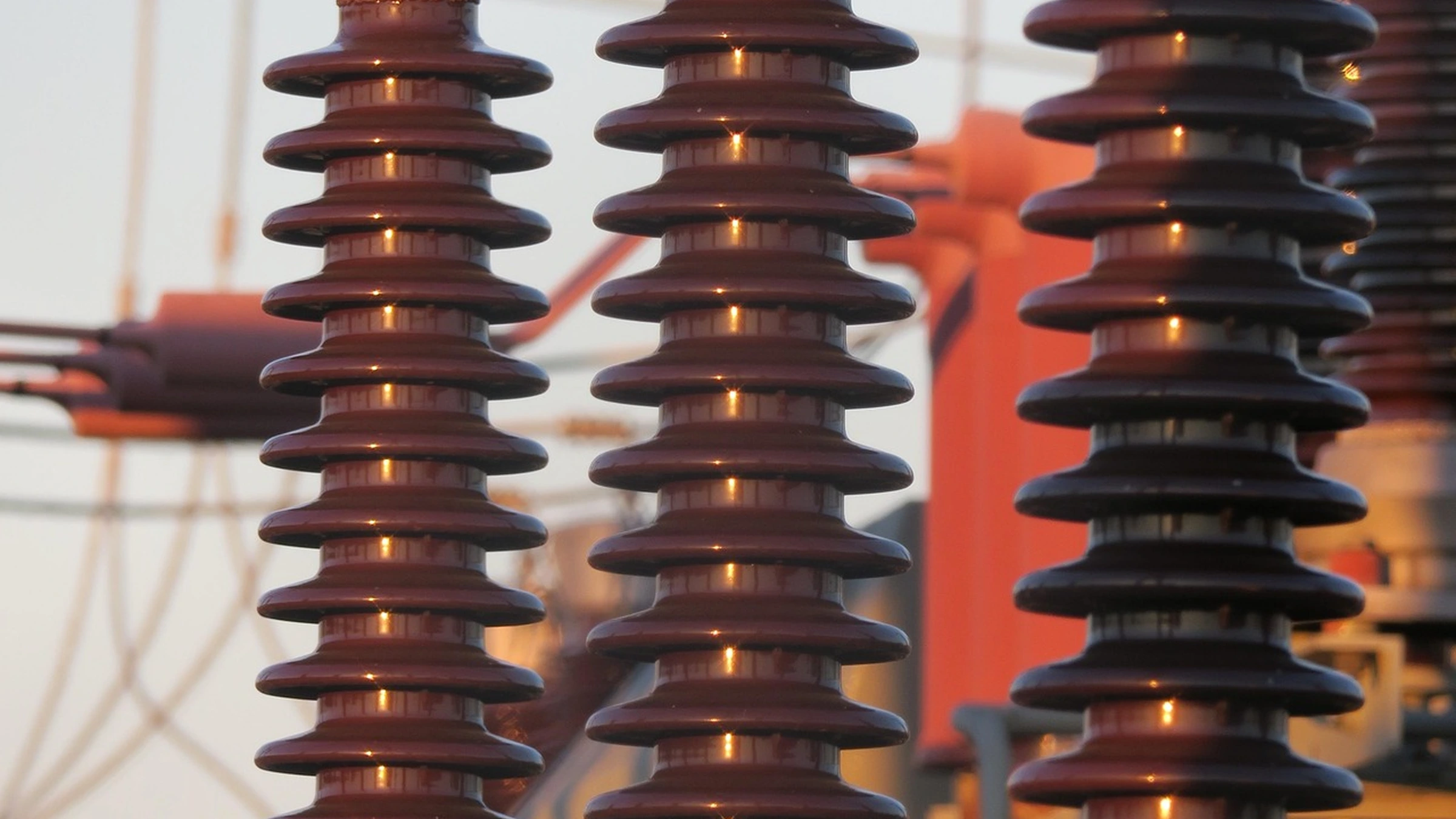 Close view of electrical insulators and transmission equipment