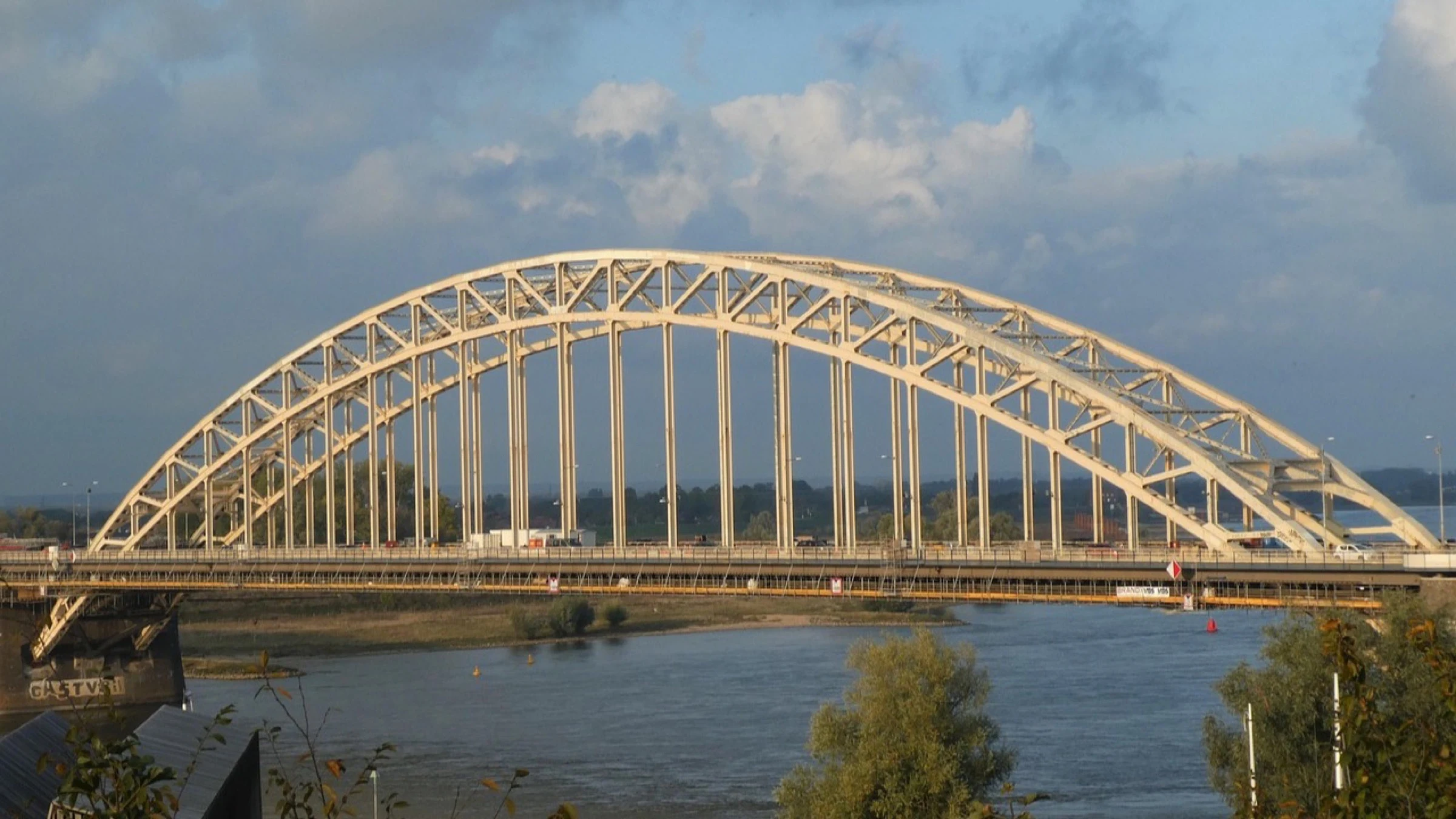 Steel arch bridge across the river at Nijmegen.