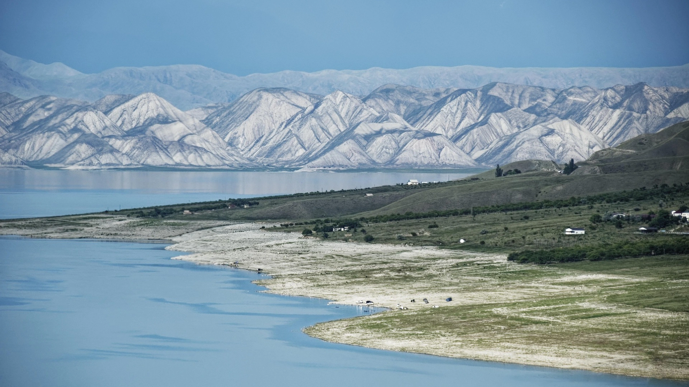 Reservoir shoreline and mountains at Toktogul in Kyrgyzstan