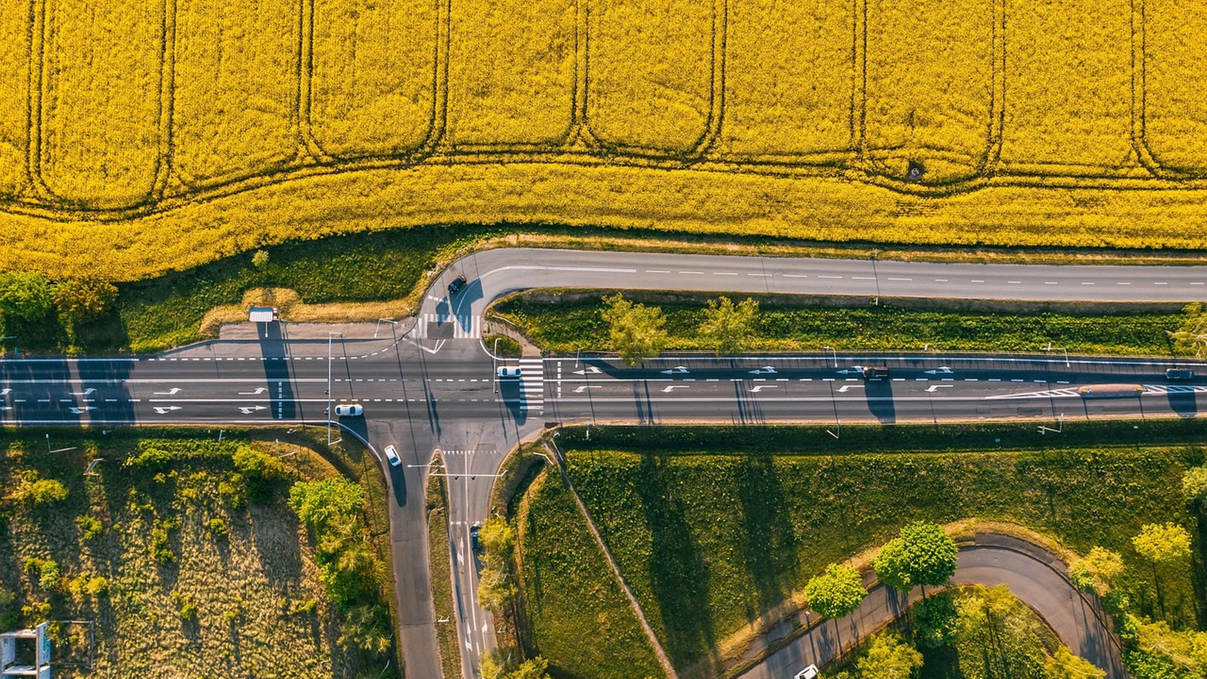 Aerial view of fields and a road near Komorniki in Poland