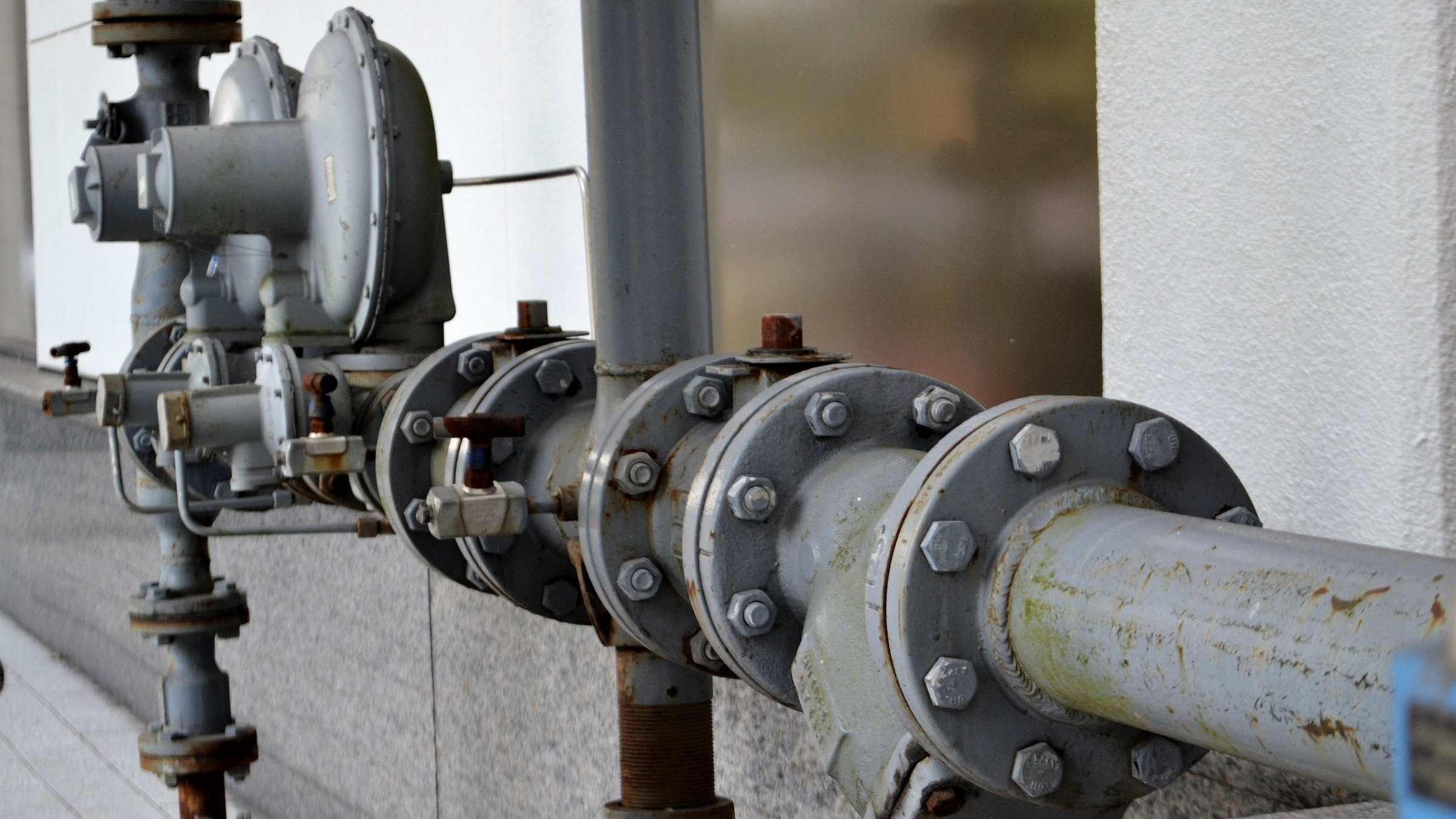 Pipework with bolted flanges and a valve assembly.